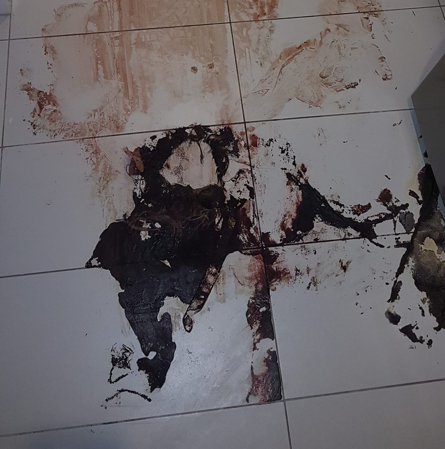 Crime Scene with Blood on the Floor in a kitchen